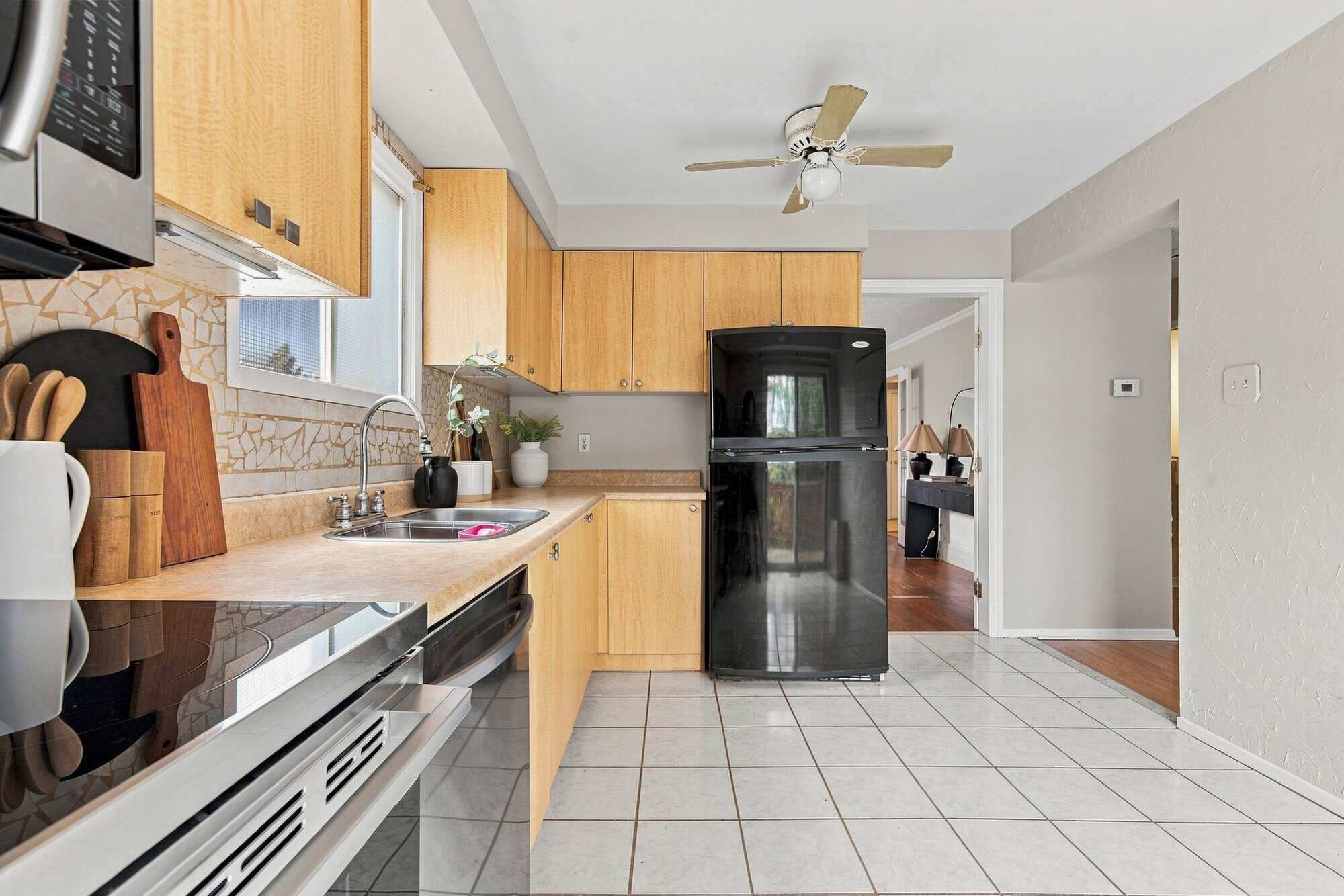 Kitchen at 22 Kipling Cres, South Ajax, from a second angle showing counter space and cabinetry, listed by Laura McBride, Ajax REALTOR®