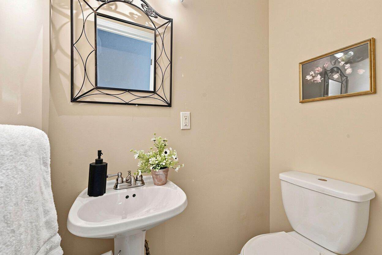 Main-floor 2-piece powder room at 22 Kipling Cres, South Ajax, listed by Laura McBride, Ajax REALTOR®