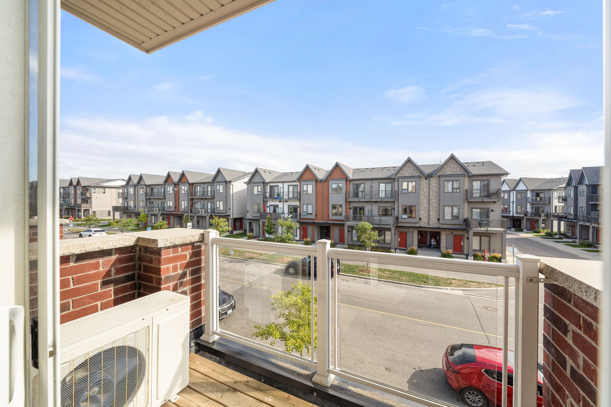 East-facing private balcony at 2598 William Jackson Dr, Pickering, overlooking the neighbourhood