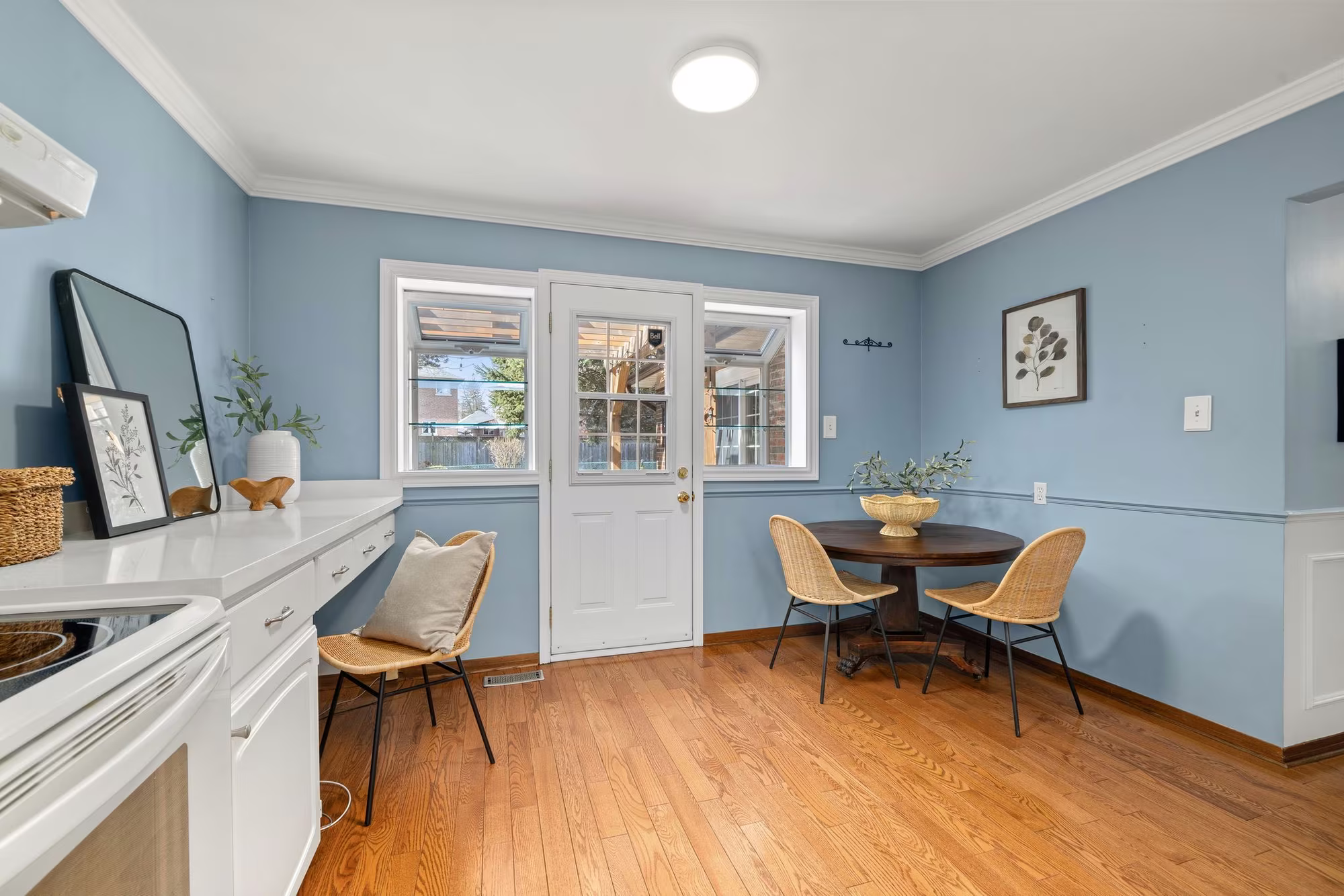 Breakfast area at 38A Deep Dene Dr, Highland Creek Village, with French doors to the backyard