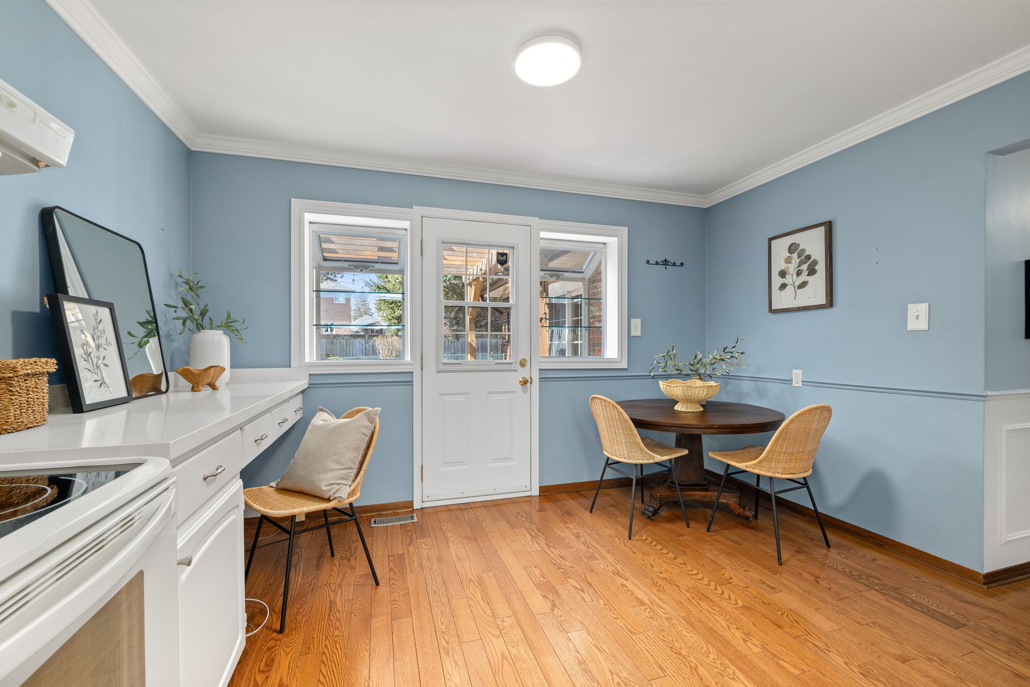 Breakfast area at 38A Deep Dene Dr, Highland Creek Village, with French doors to the backyard