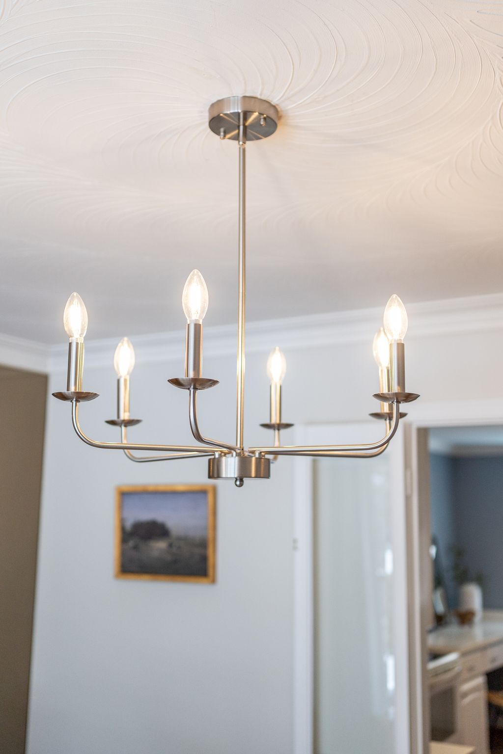 Dining room chandelier detail at 38A Deep Dene Dr, Highland Creek Village