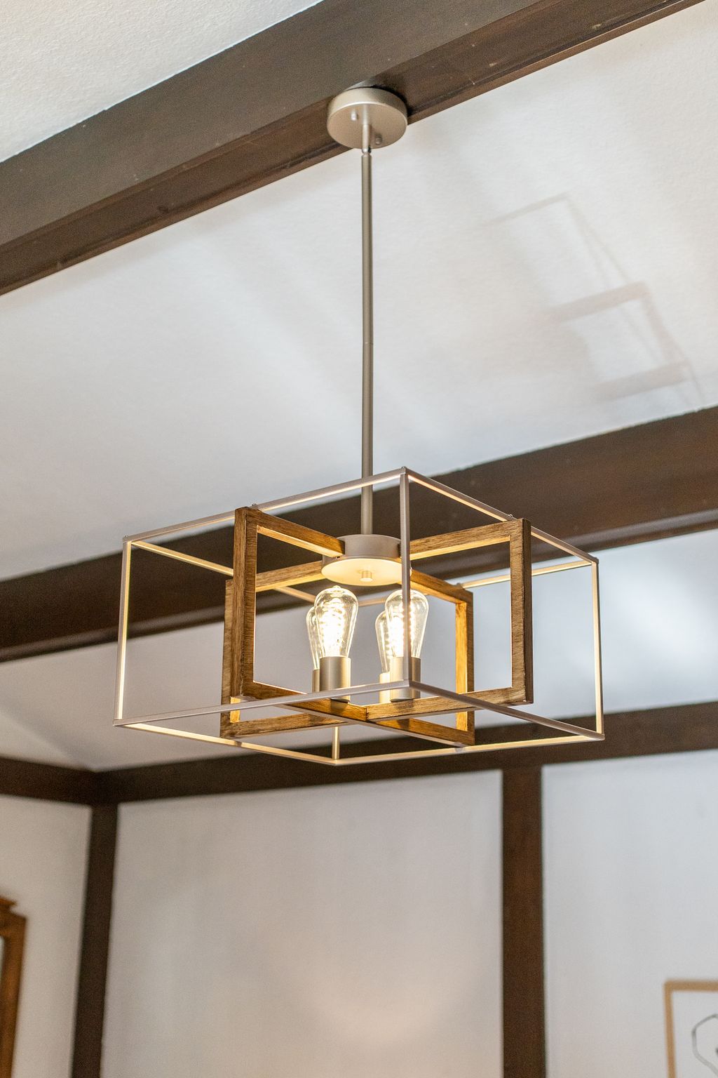 Wood beam ceiling and lighting detail in the family room at 38A Deep Dene Dr, Highland Creek Village