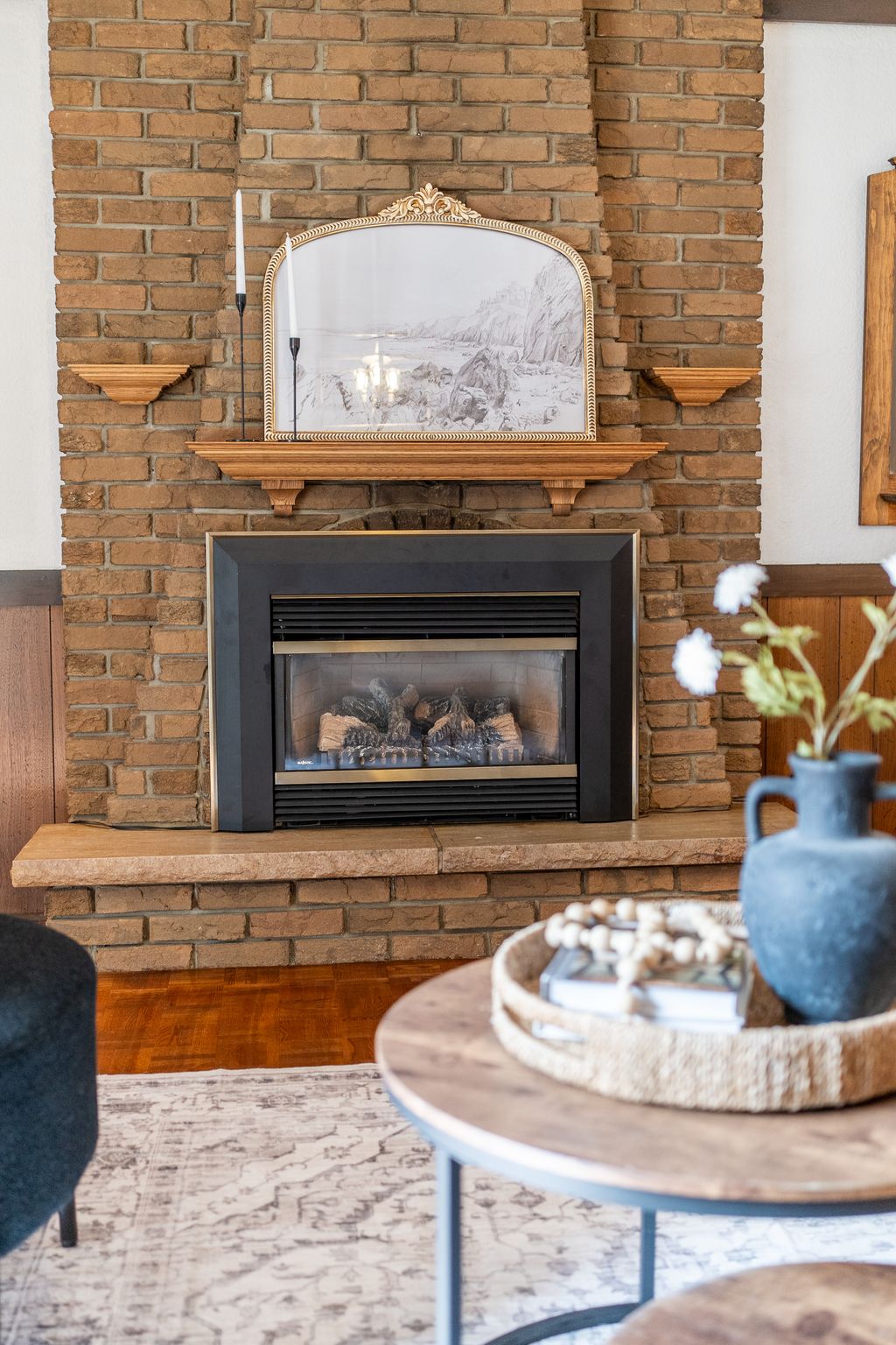 Gas fireplace with brick surround in the family room at 38A Deep Dene Dr, Highland Creek Village