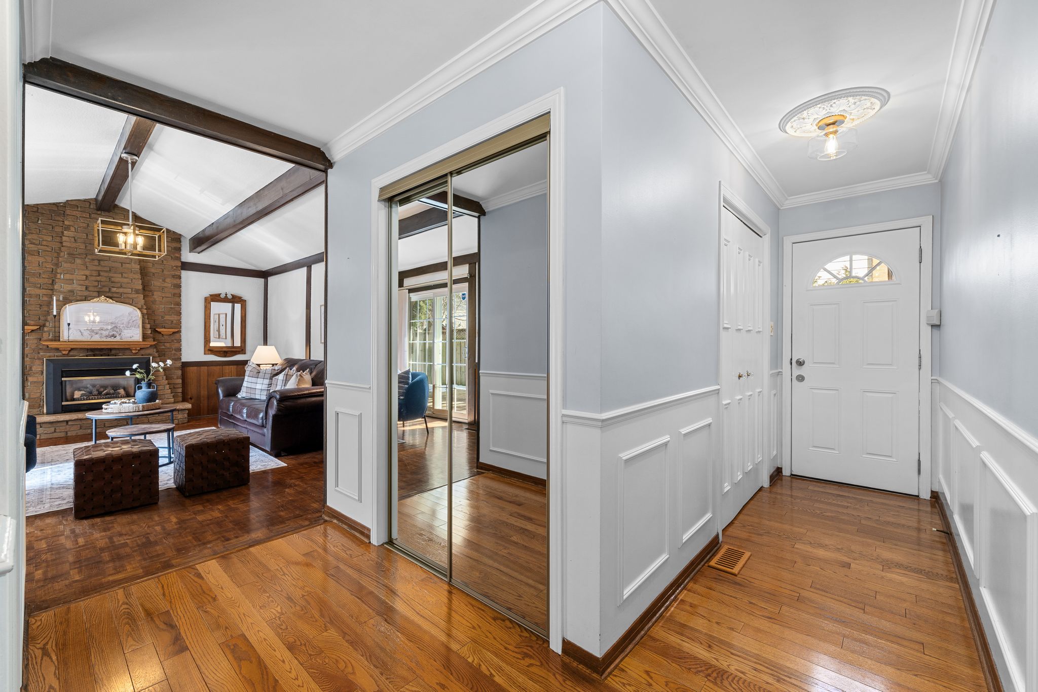 Vaulted family room at 38A Deep Dene Dr, Highland Creek Village, with wood beam ceiling
