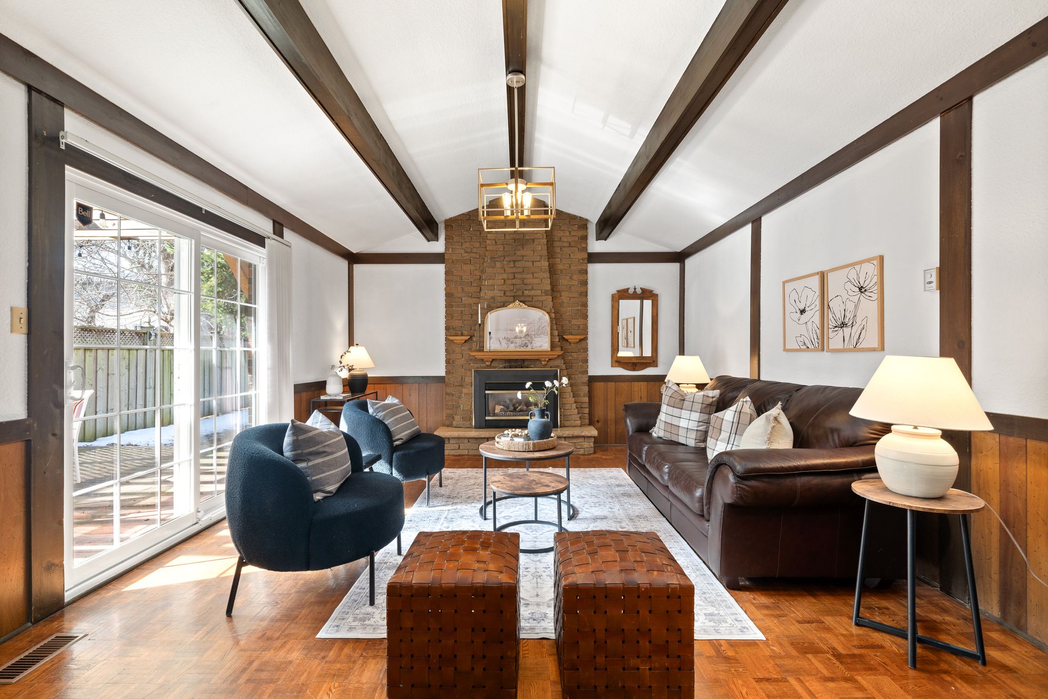 Family room walkout to the pergola-covered deck at 38A Deep Dene Dr, Highland Creek Village