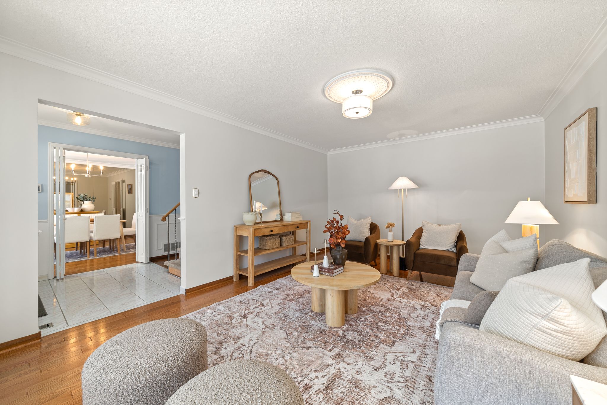 Living room at 38A Deep Dene Dr, Highland Creek Village, with a bay window and hardwood floors