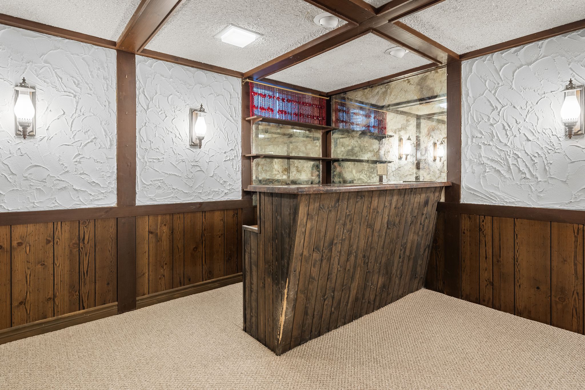 Built-in bar in the finished basement at 38A Deep Dene Dr, Highland Creek Village