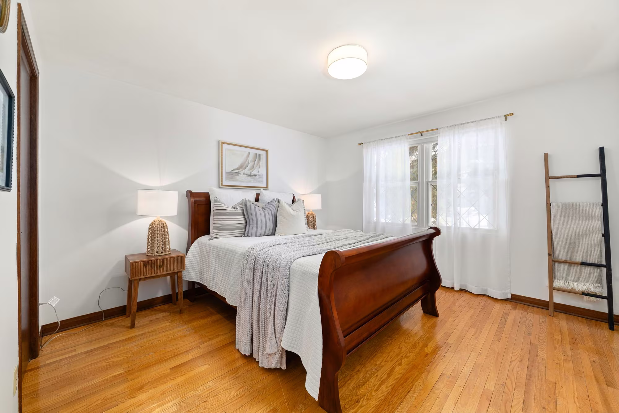 Third bedroom at 38A Deep Dene Dr, Highland Creek Village, with a wood sleigh bed