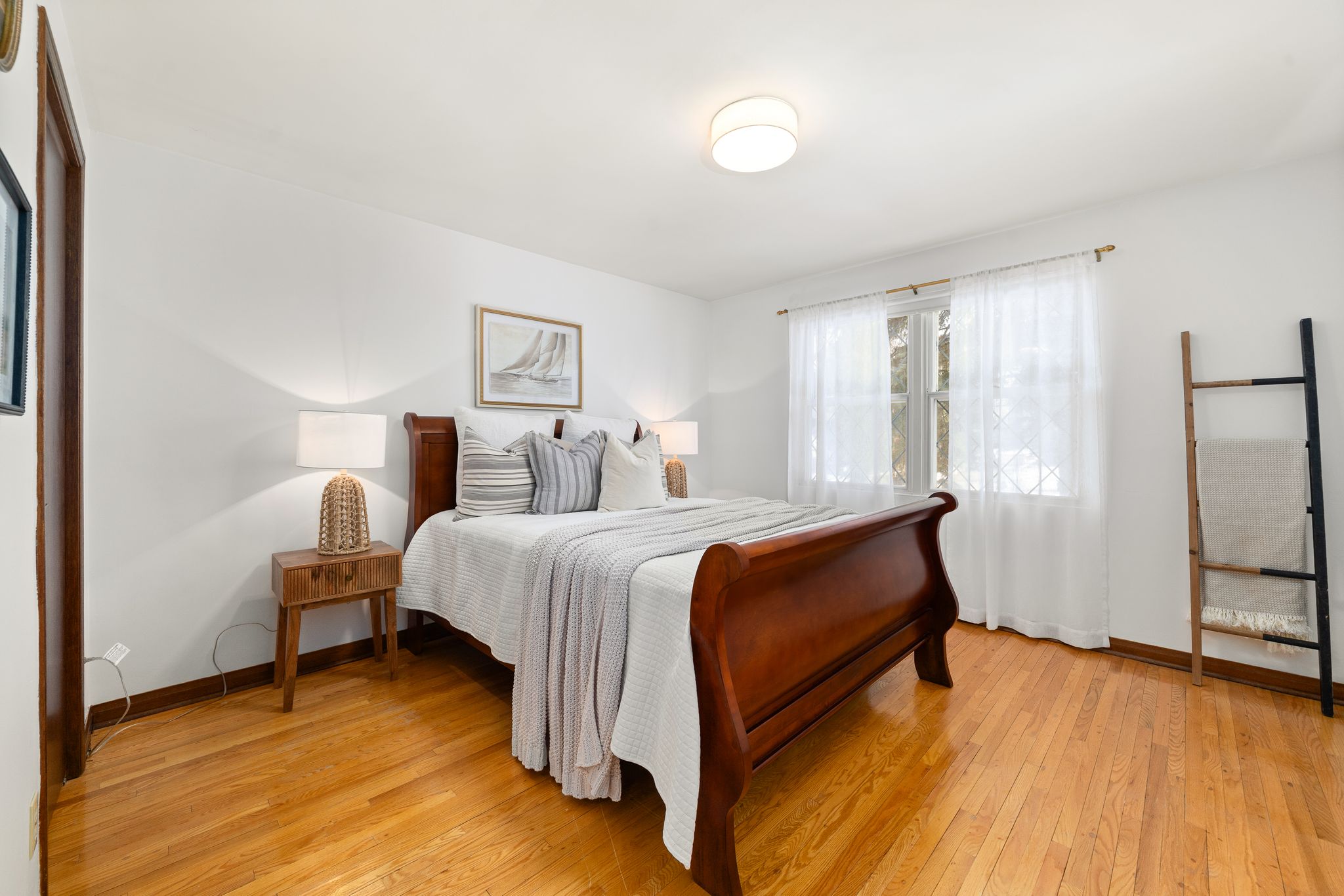 Third bedroom at 38A Deep Dene Dr, Highland Creek Village, with a wood sleigh bed