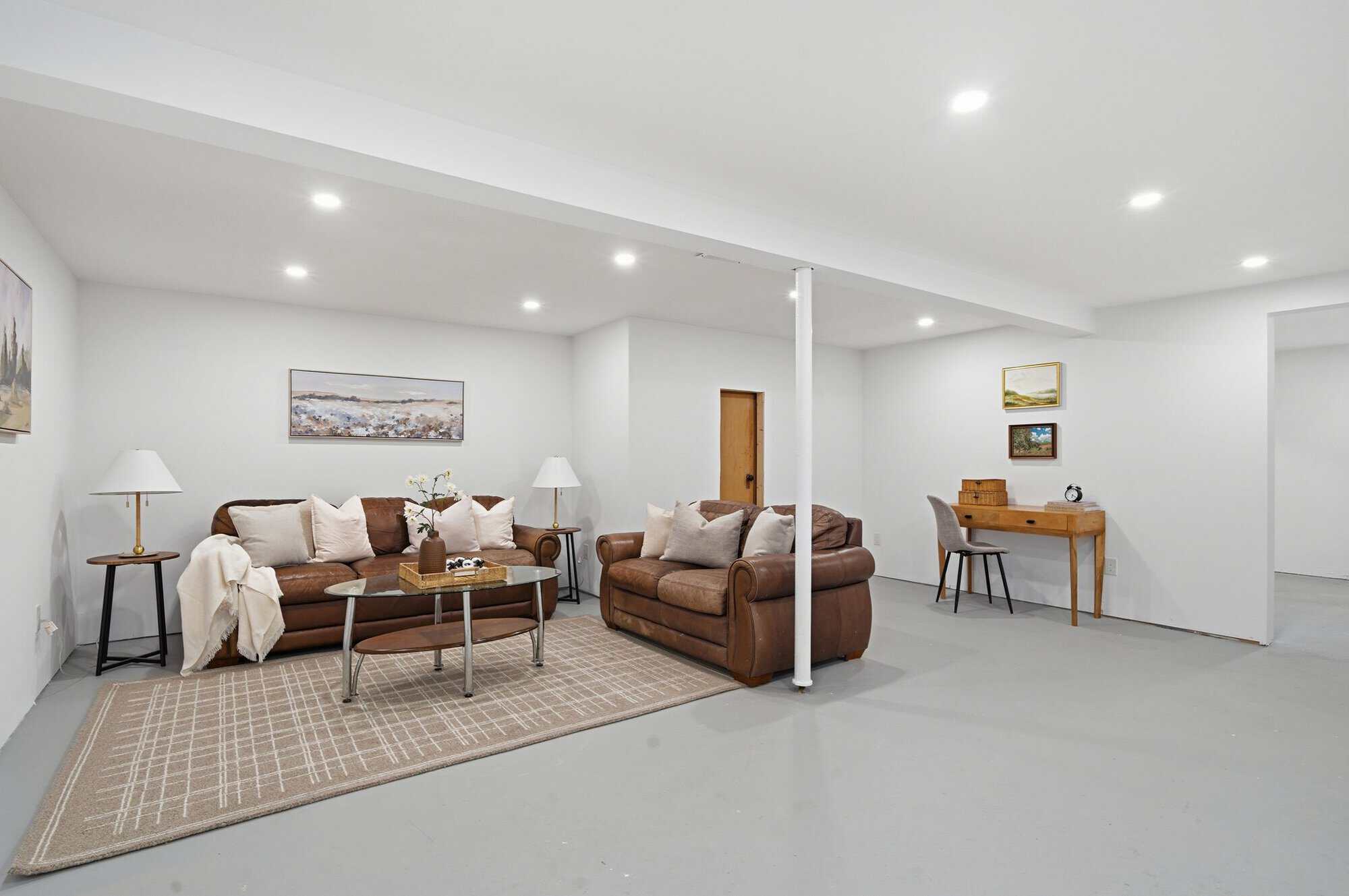 Concept rendering of a basement recreation room at 39 Anstead Crescent, South Ajax, virtually staged