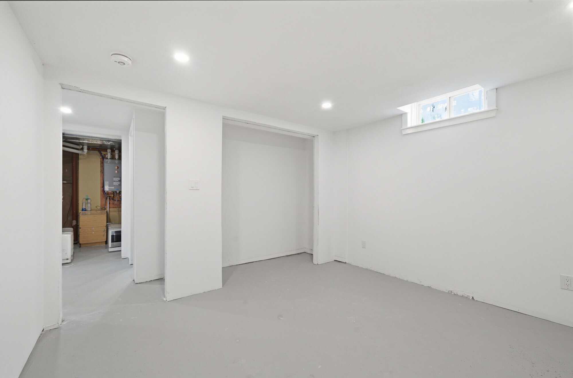 Unfinished basement room at 39 Anstead Crescent, South Ajax, from a second angle