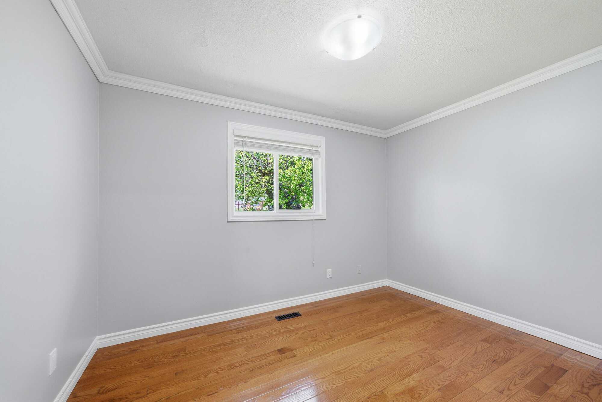 Third bedroom at 39 Anstead Crescent, South Ajax, with hardwood floors