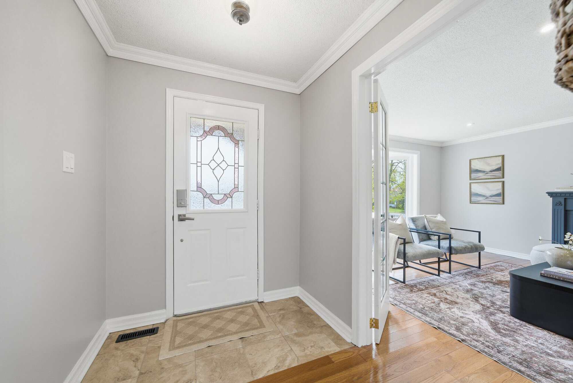 Front entry at 39 Anstead Crescent, South Ajax, with tile flooring and glass-panel door to the living room