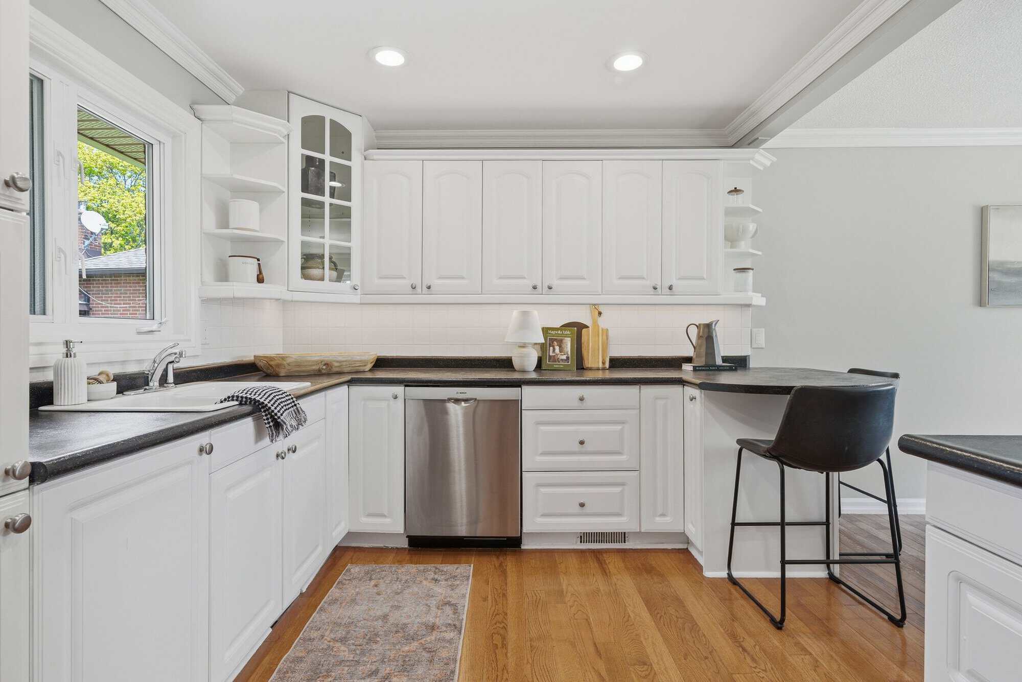 Kitchen sink at 39 Anstead Crescent, South Ajax, with a window and stainless steel dishwasher