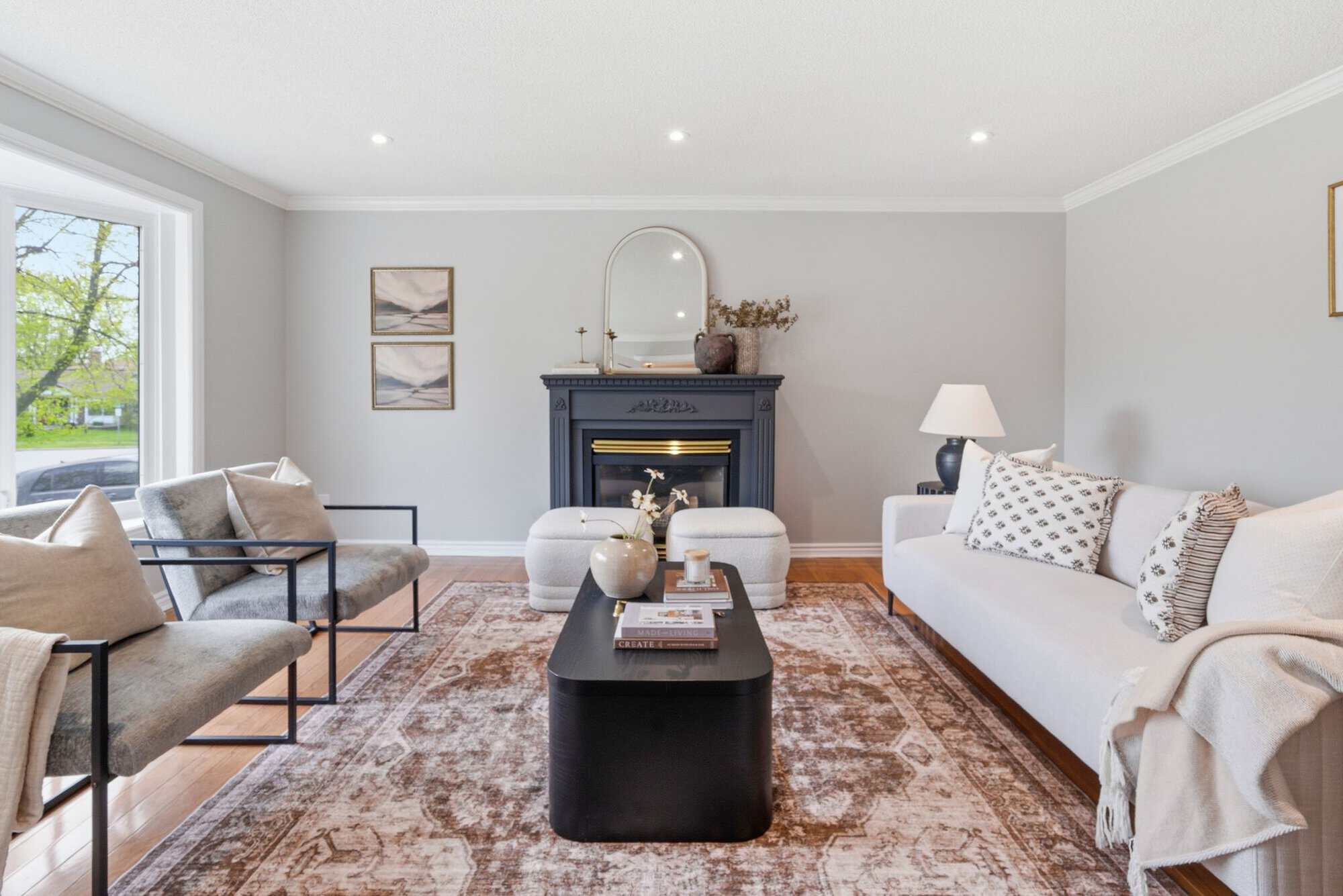 Living room at 39 Anstead Crescent, South Ajax, with a fireplace and hardwood floors