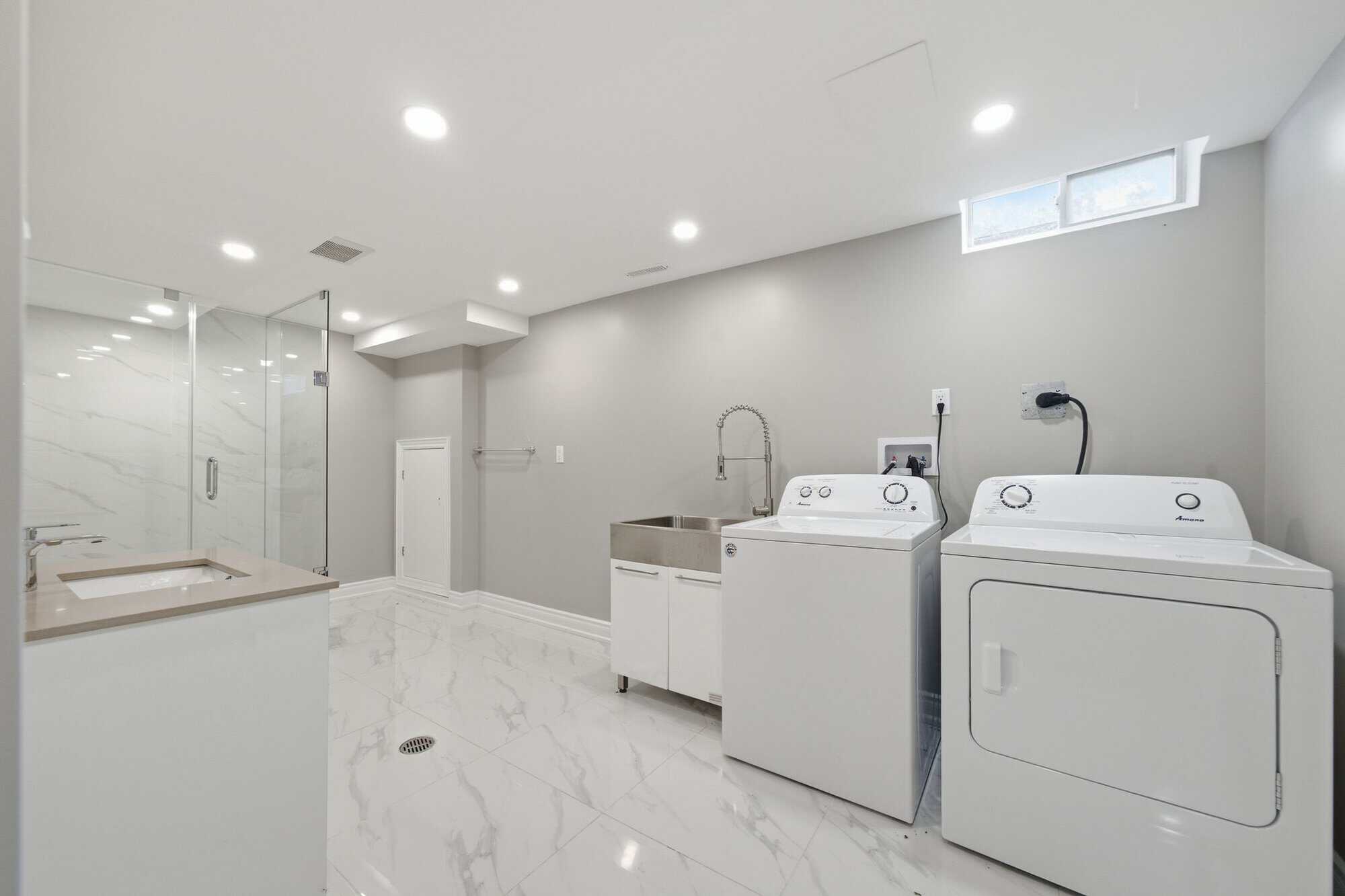 Basement laundry area at 96 Bolland Crescent, South Ajax