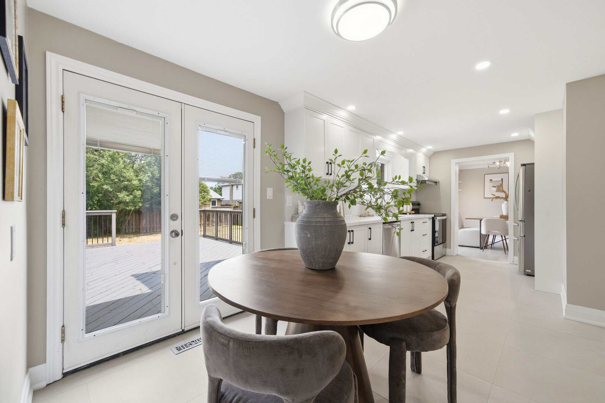 Breakfast area at 96 Bolland Crescent, South Ajax, with a walk-out to the deck