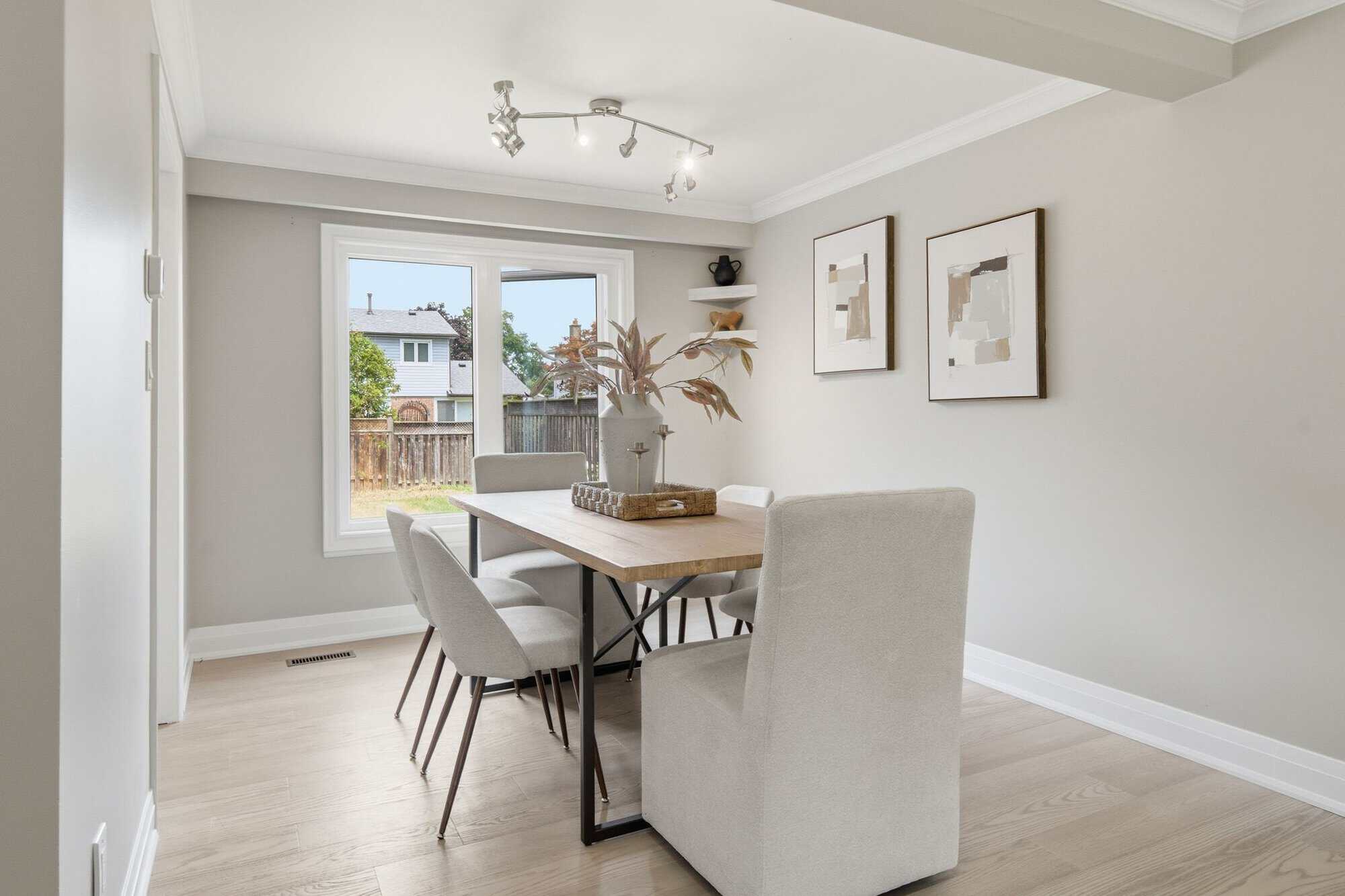 Dining room at 96 Bolland Crescent, South Ajax, with a large window and pot lights