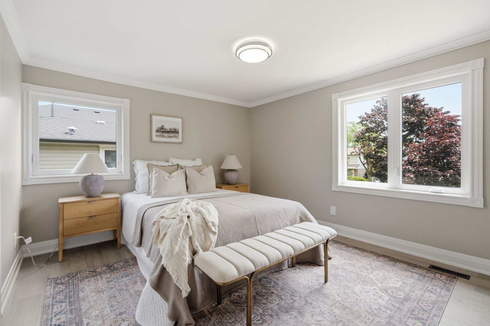 Primary bedroom at 96 Bolland Crescent, South Ajax, with a large window and double closet