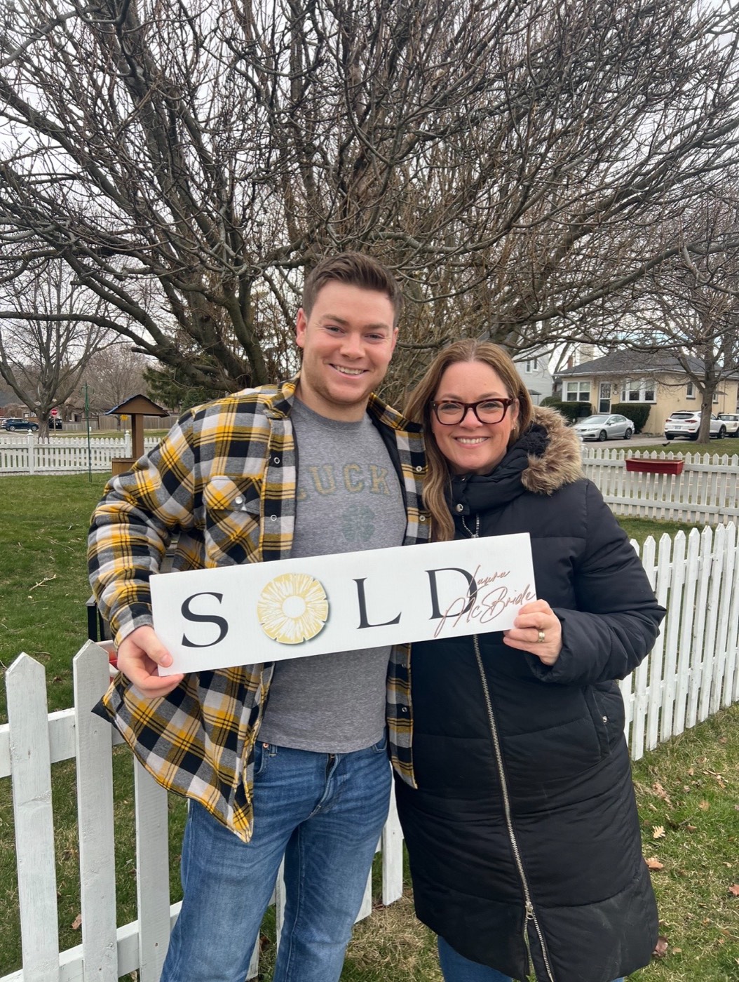 Oshawa buyers on closing day with Laura McBride, Ajax REALTOR&reg;