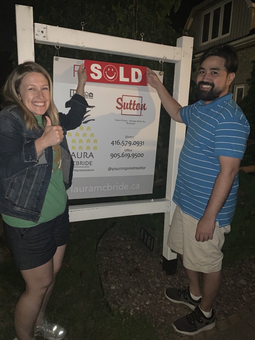 A Pickering couple on closing day with Laura McBride, Ajax REALTOR&reg;