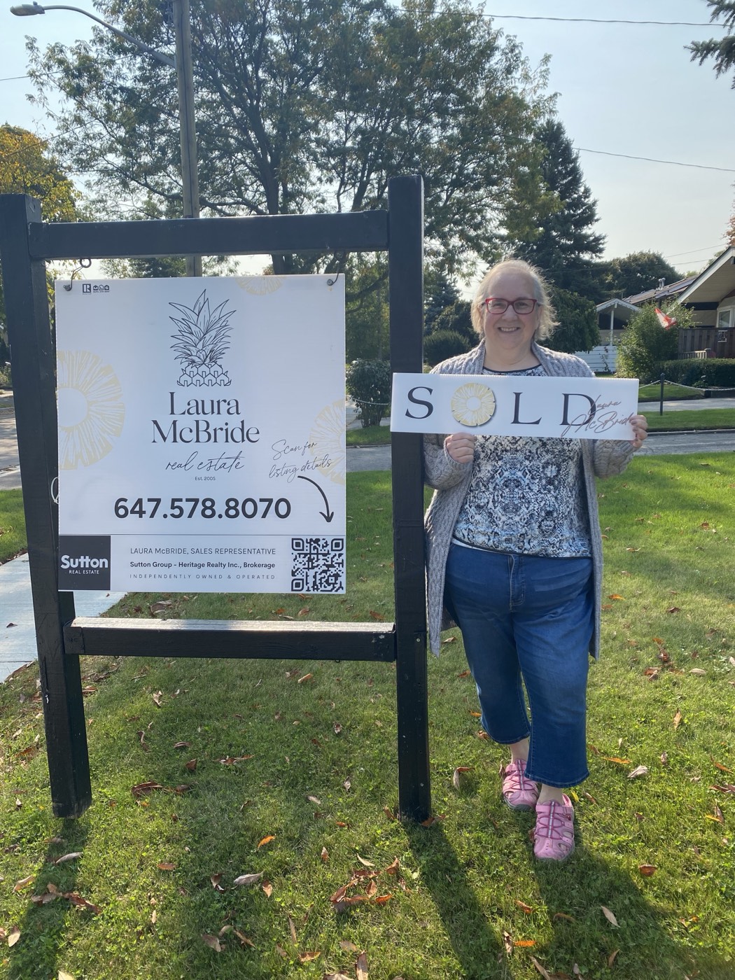 A Scarborough client celebrating a sale with Laura McBride, REALTOR&reg;