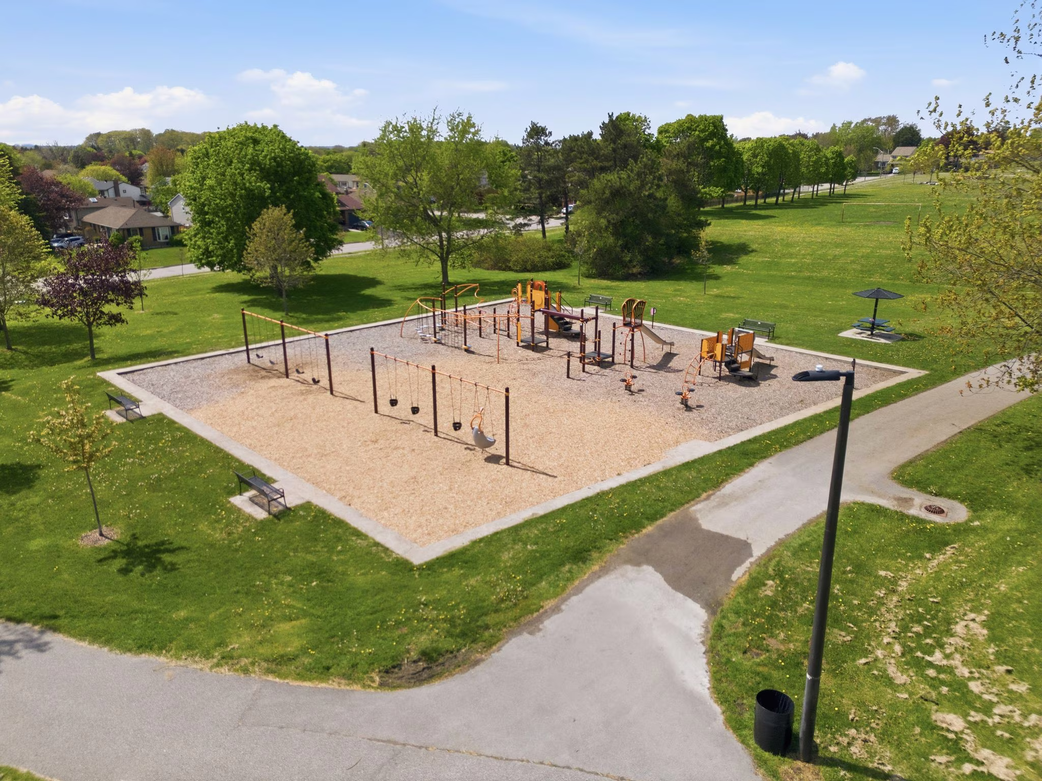 Aerial view of a Discovery Bay park and playground, South Ajax, walkable from surrounding homes